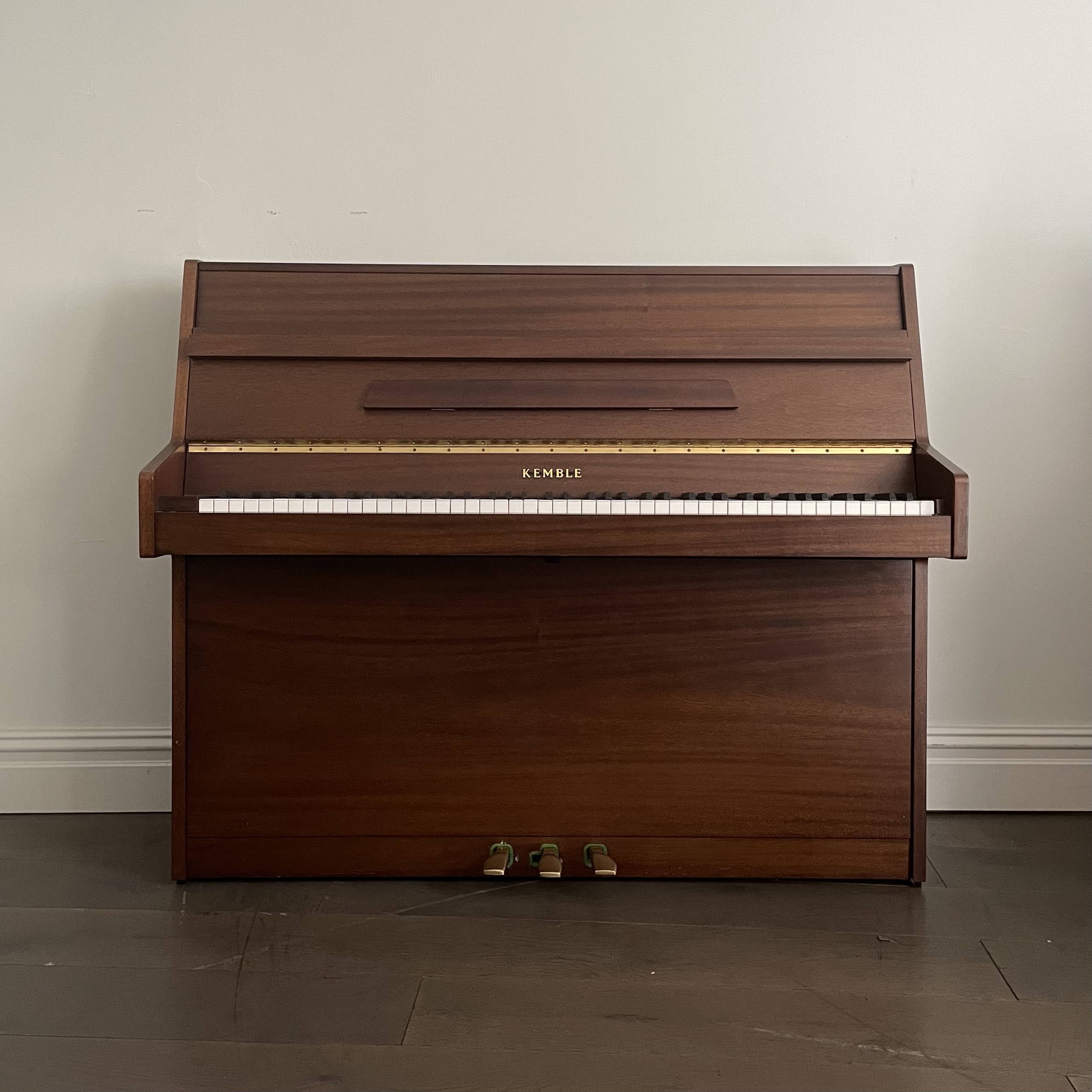 A Kemble Upright Piano
