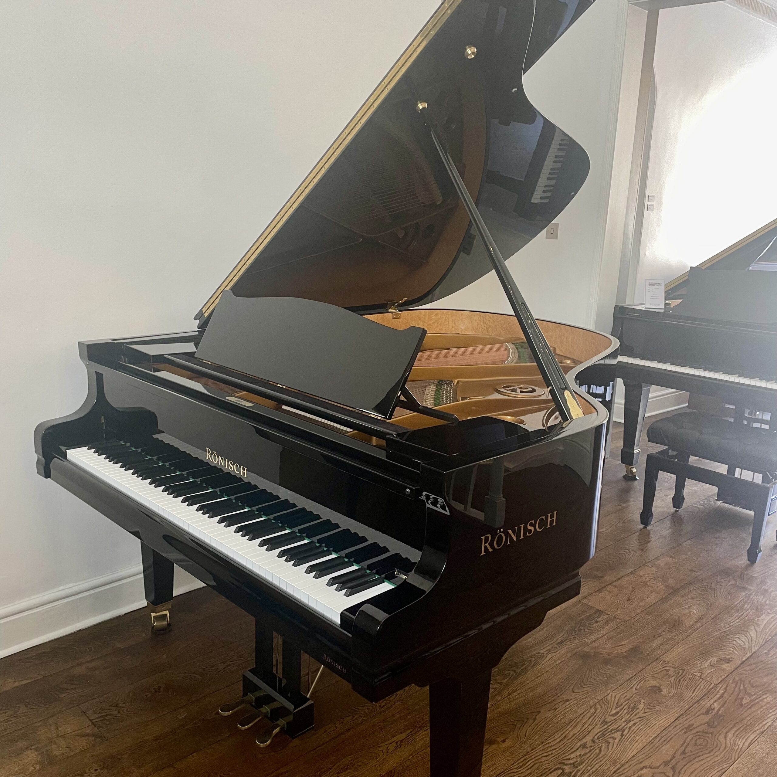 A Ronisch 192 Grand Piano