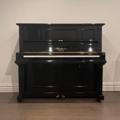 A Bluthner Upright Piano